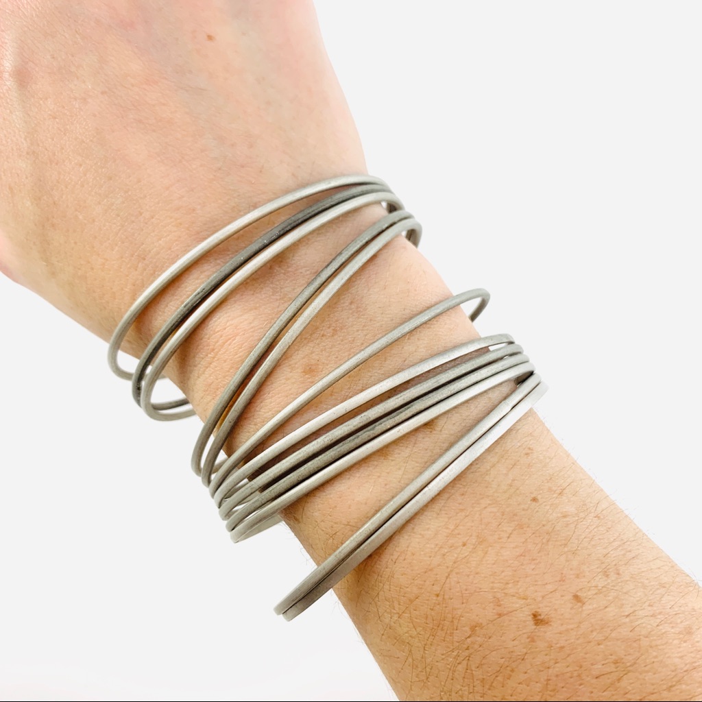 Vintage Set Of 10 Silver Bangles